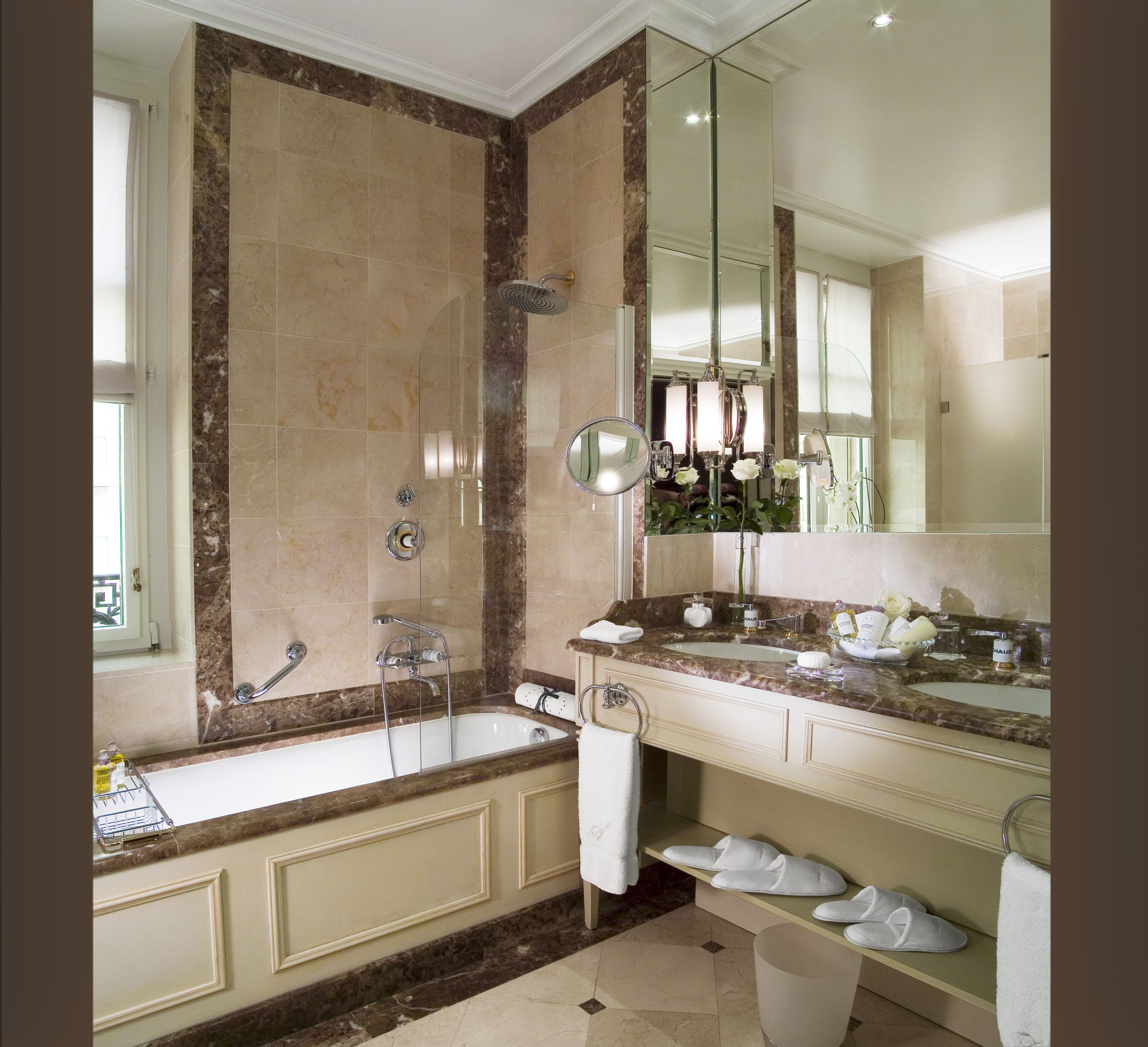 combined shower/bathtub, designer toiletries, hair dryer, bathrobes