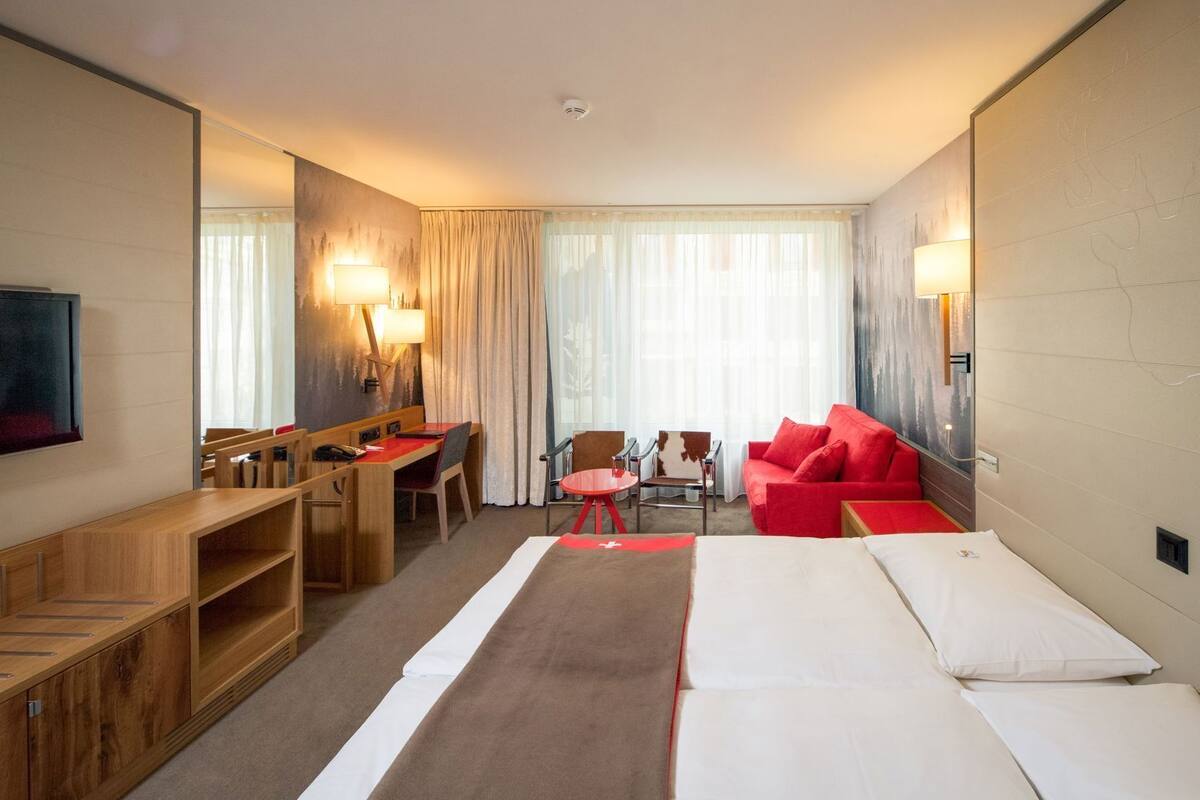 Premium bedding, down duvets, minibar, in-room safe