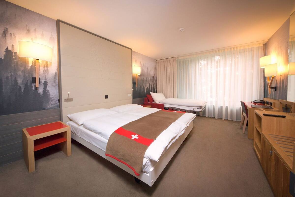 Premium bedding, down duvets, minibar, in-room safe
