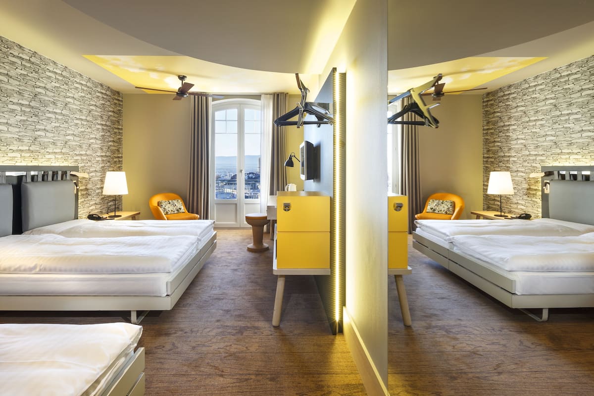 Premium bedding, down duvets, minibar, in-room safe