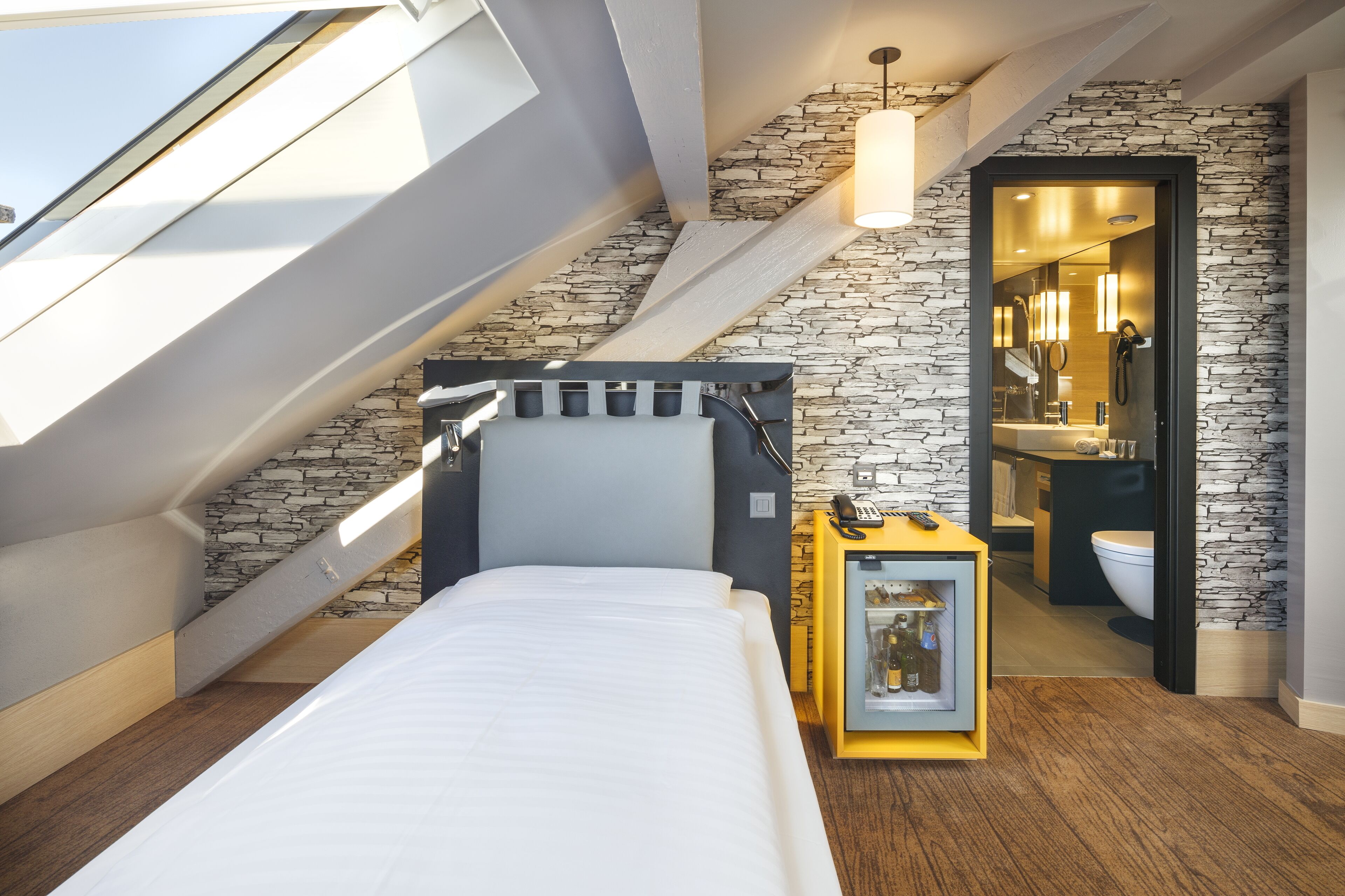 rooftop single | premium bedding, down duvets, minibar, in-room safe