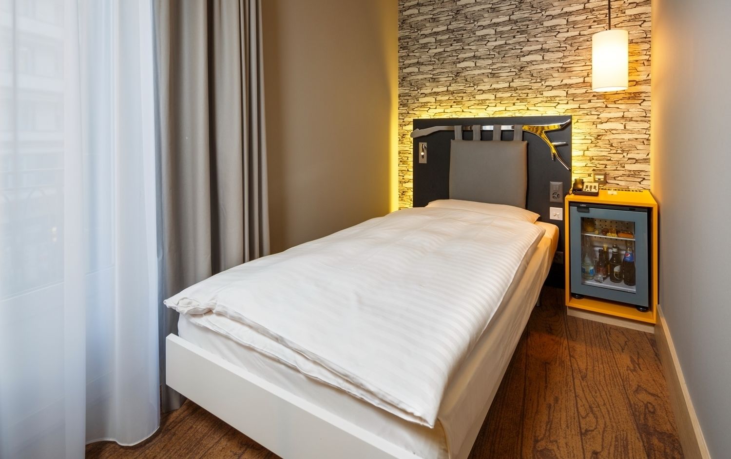 premium bedding, down duvets, minibar, in-room safe