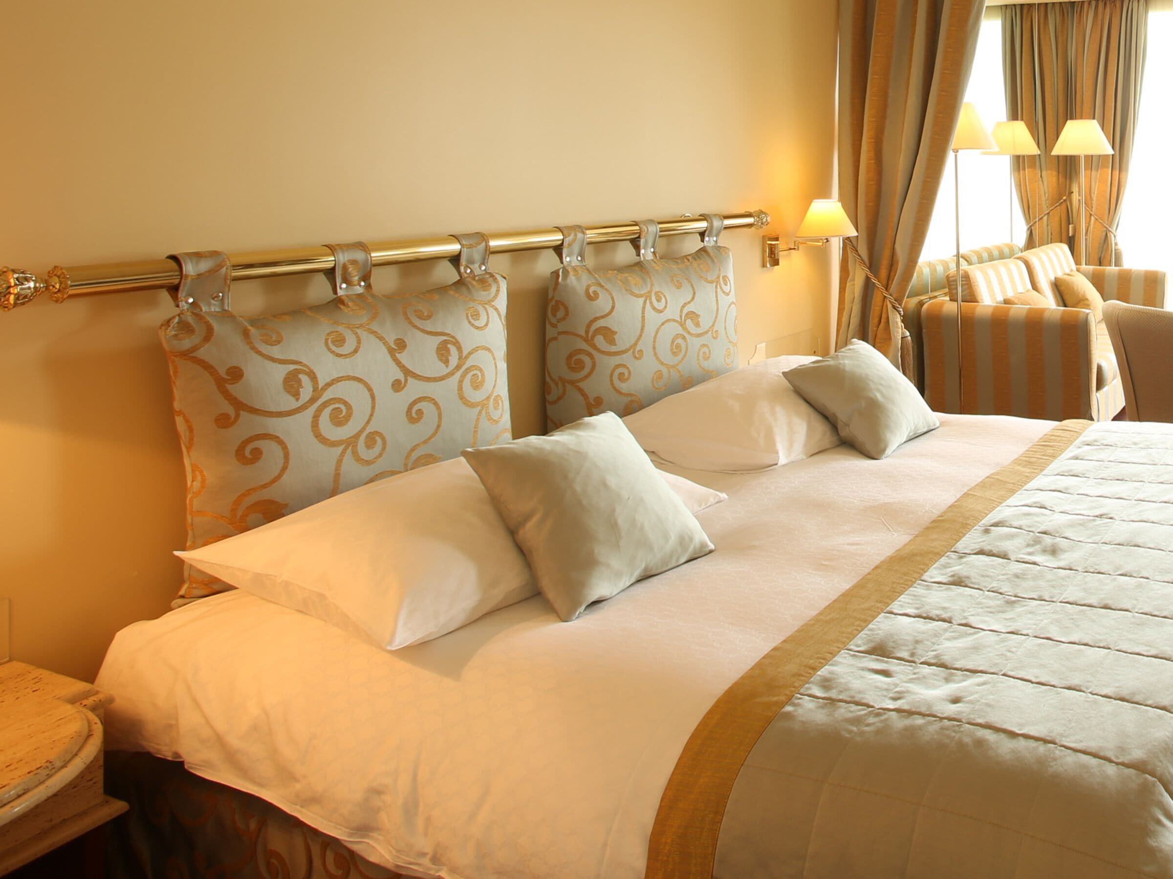 Premium bedding, down comforters, Select Comfort beds, minibar