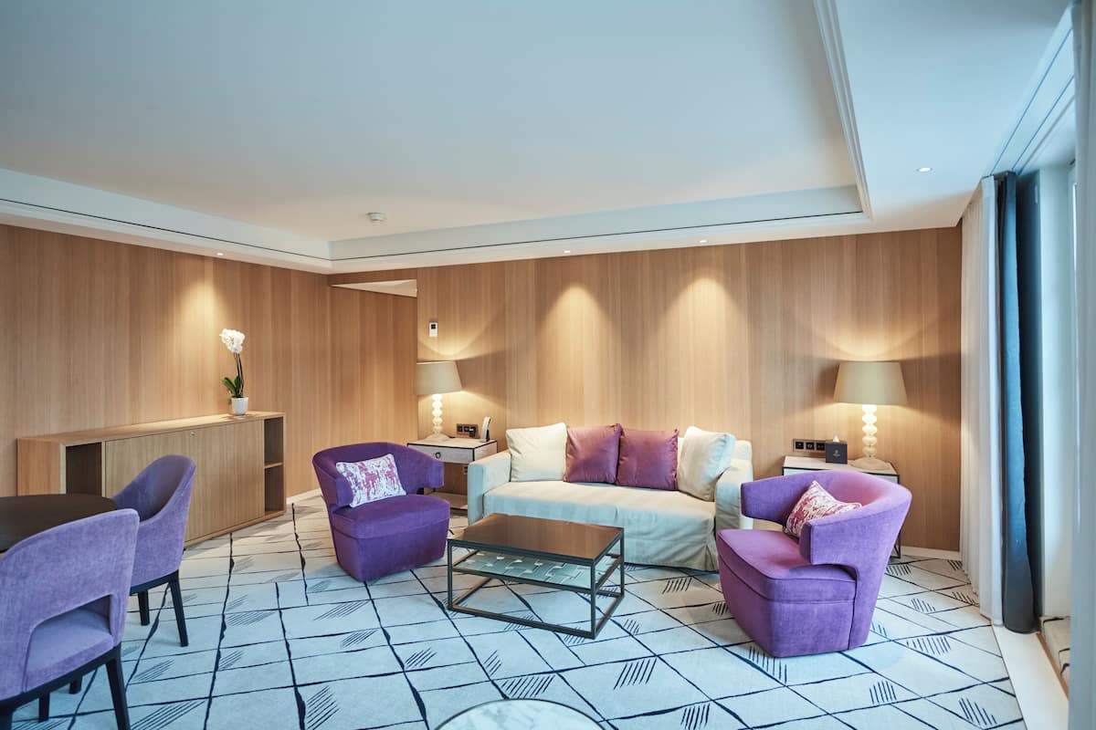 Signature Suite (Riverside) | Living area | LED TV, pay movies