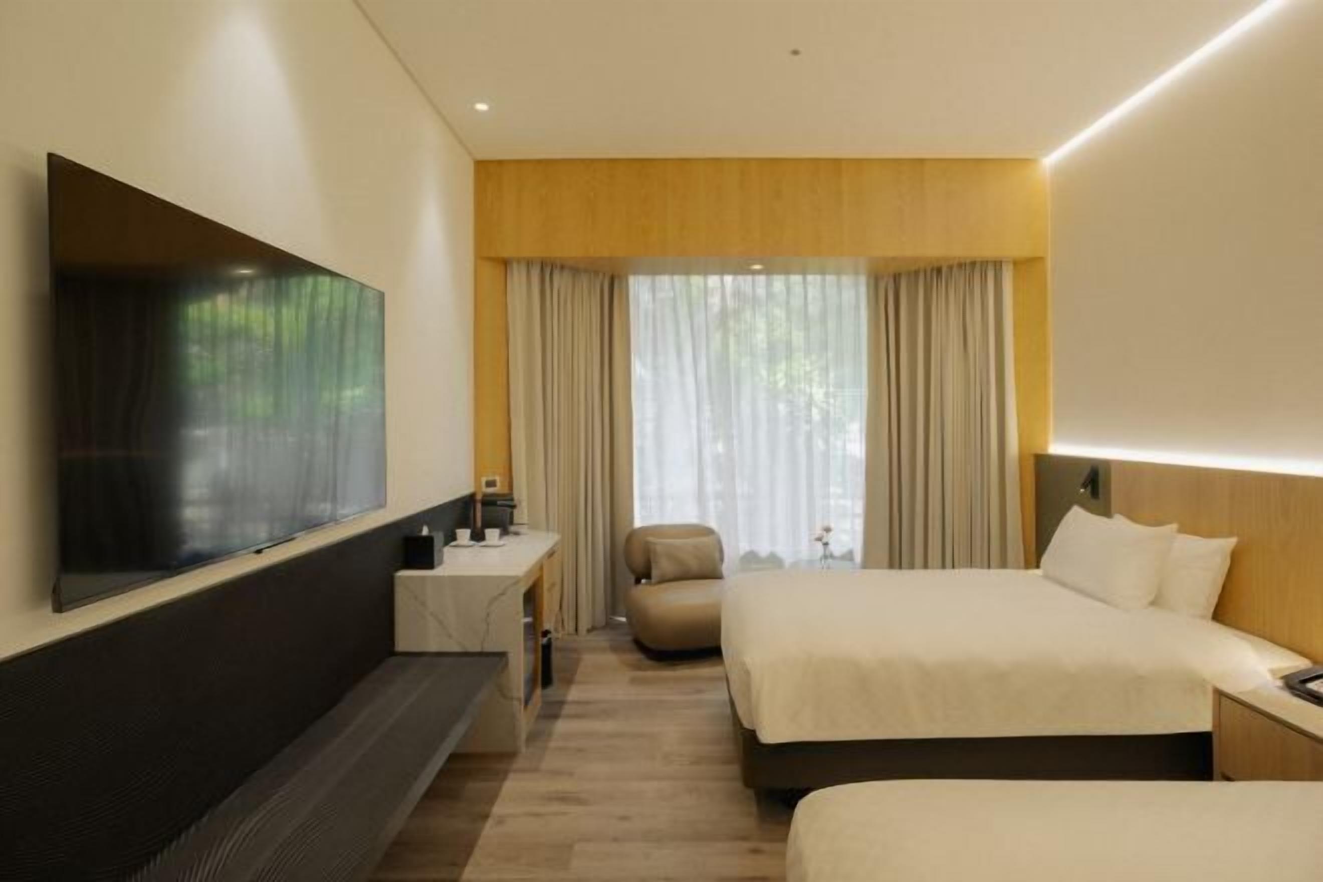 Down comforters, pillowtop beds, in-room safe, desk