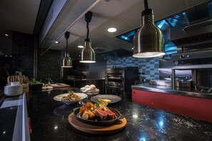 4 restaurants, breakfast, lunch, dinner served; Chinese cuisine 