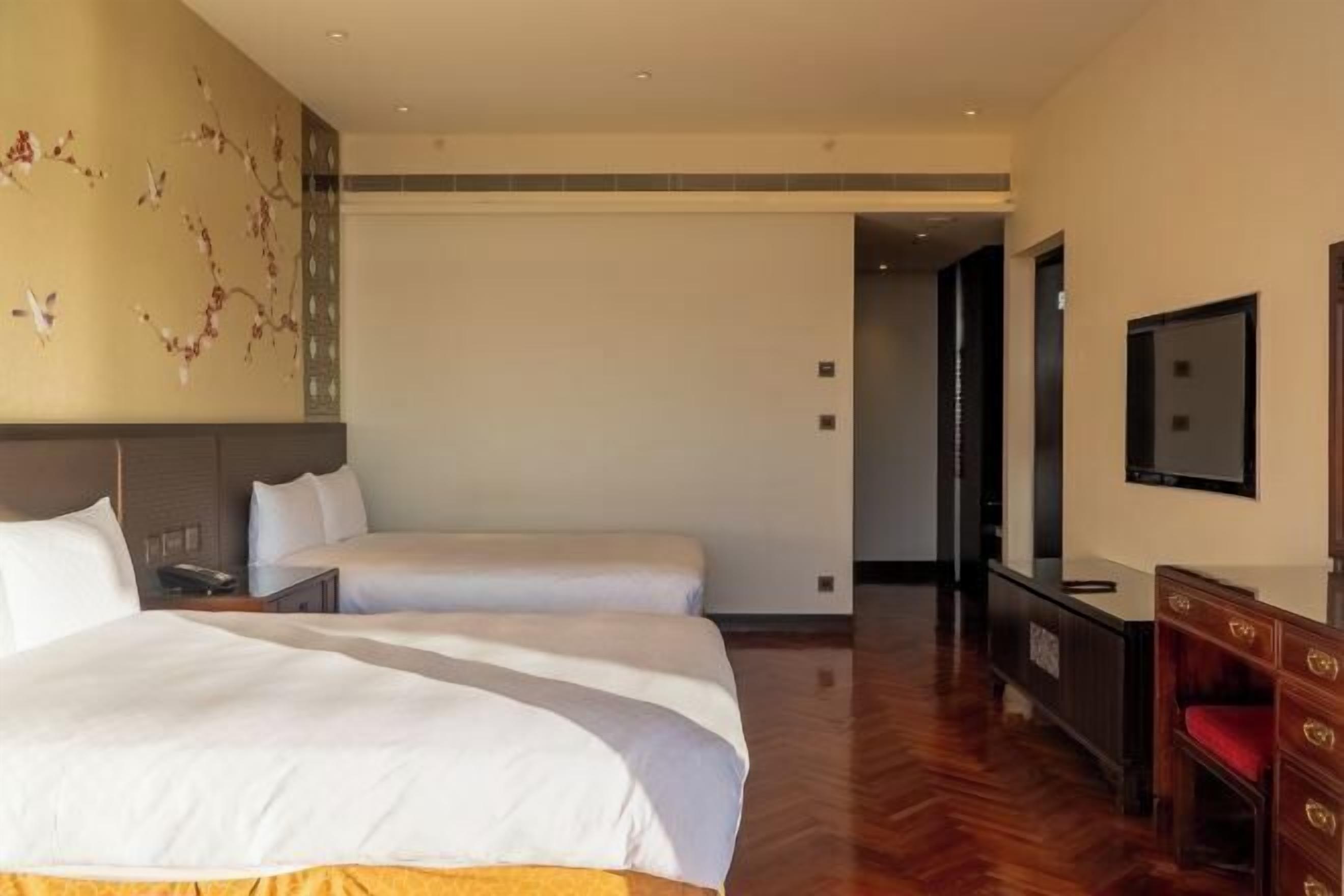 Down comforters, pillowtop beds, in-room safe, desk