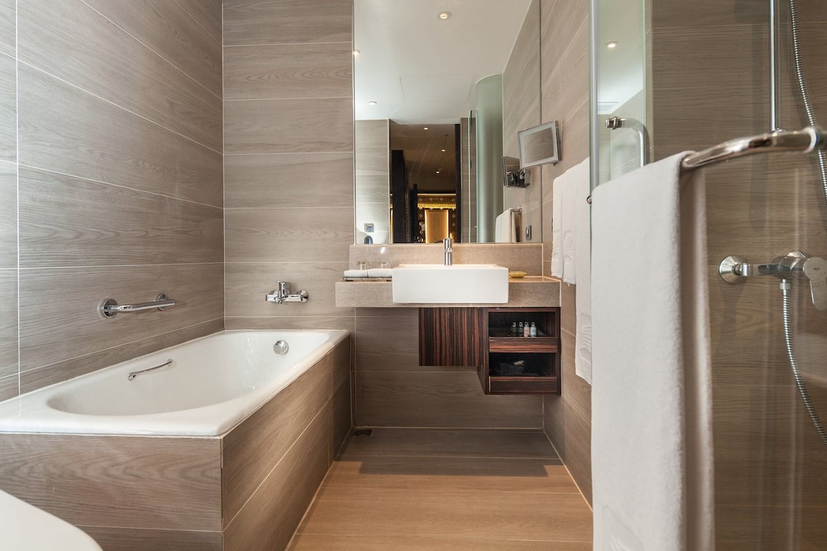 standard room, no windows | bathroom | separate bathtub and shower, rainfall showerhead, hair dryer, towels