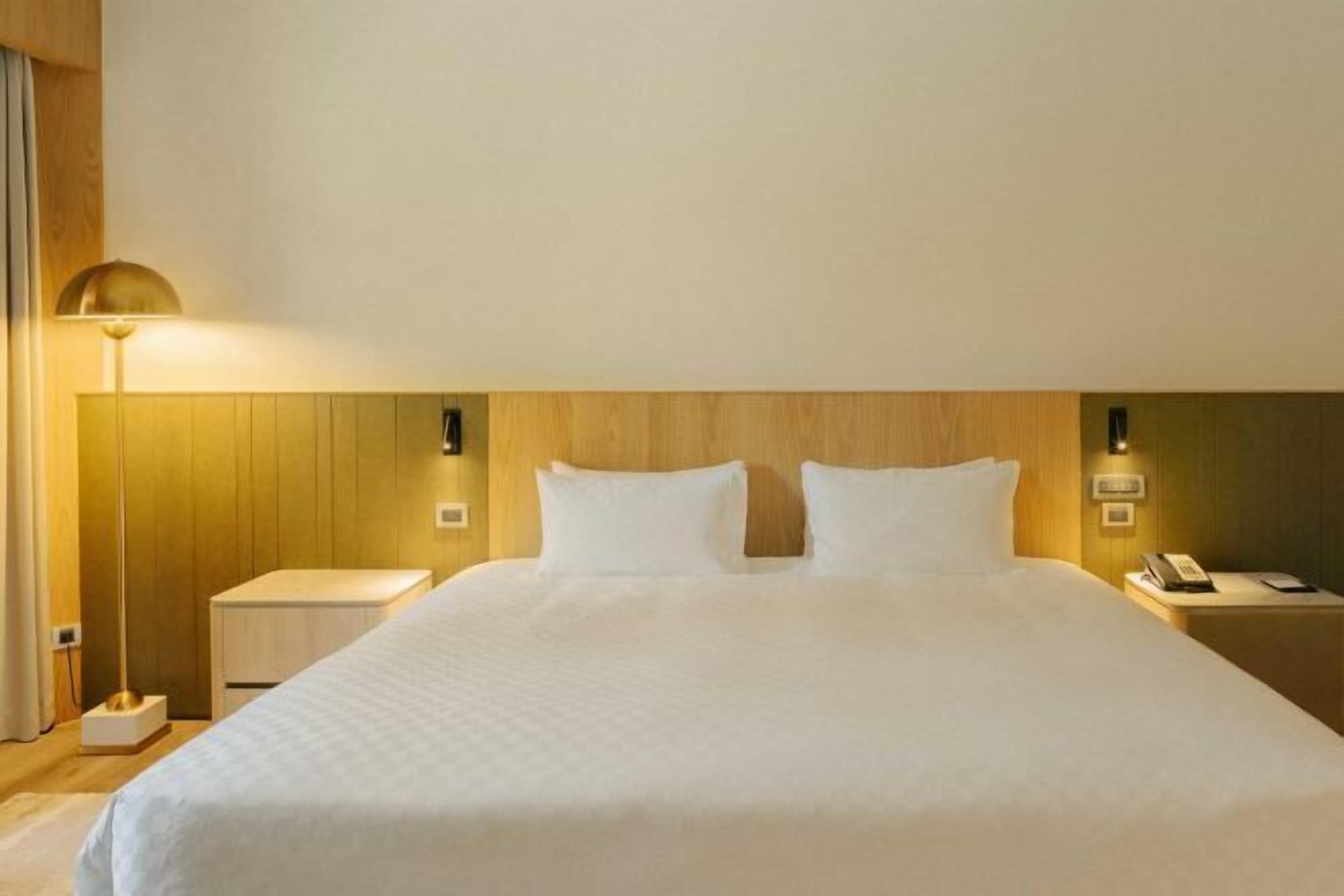 Down comforters, pillowtop beds, in-room safe, desk