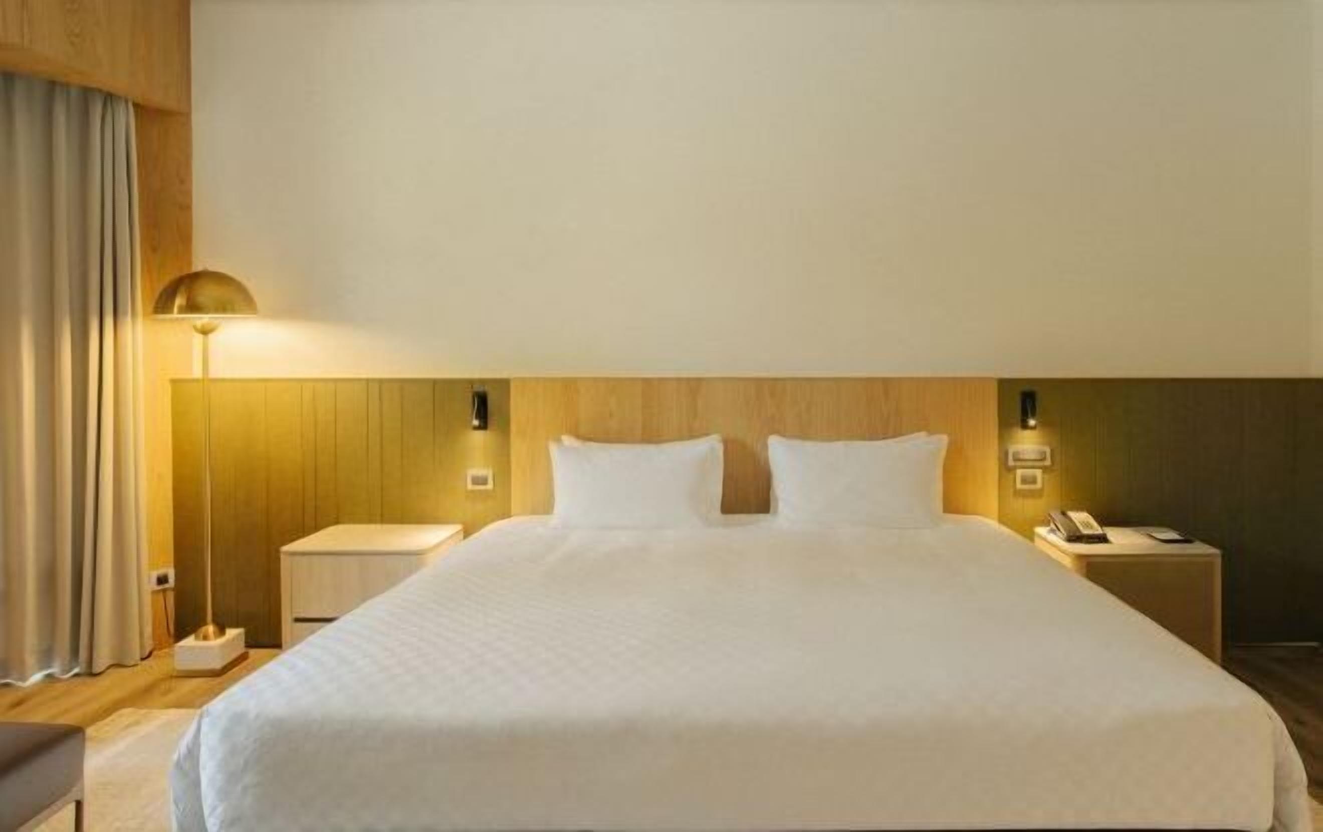 Down comforters, pillowtop beds, in-room safe, desk