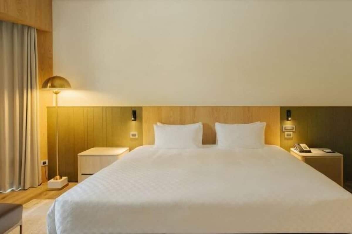Down comforters, pillowtop beds, in-room safe, desk