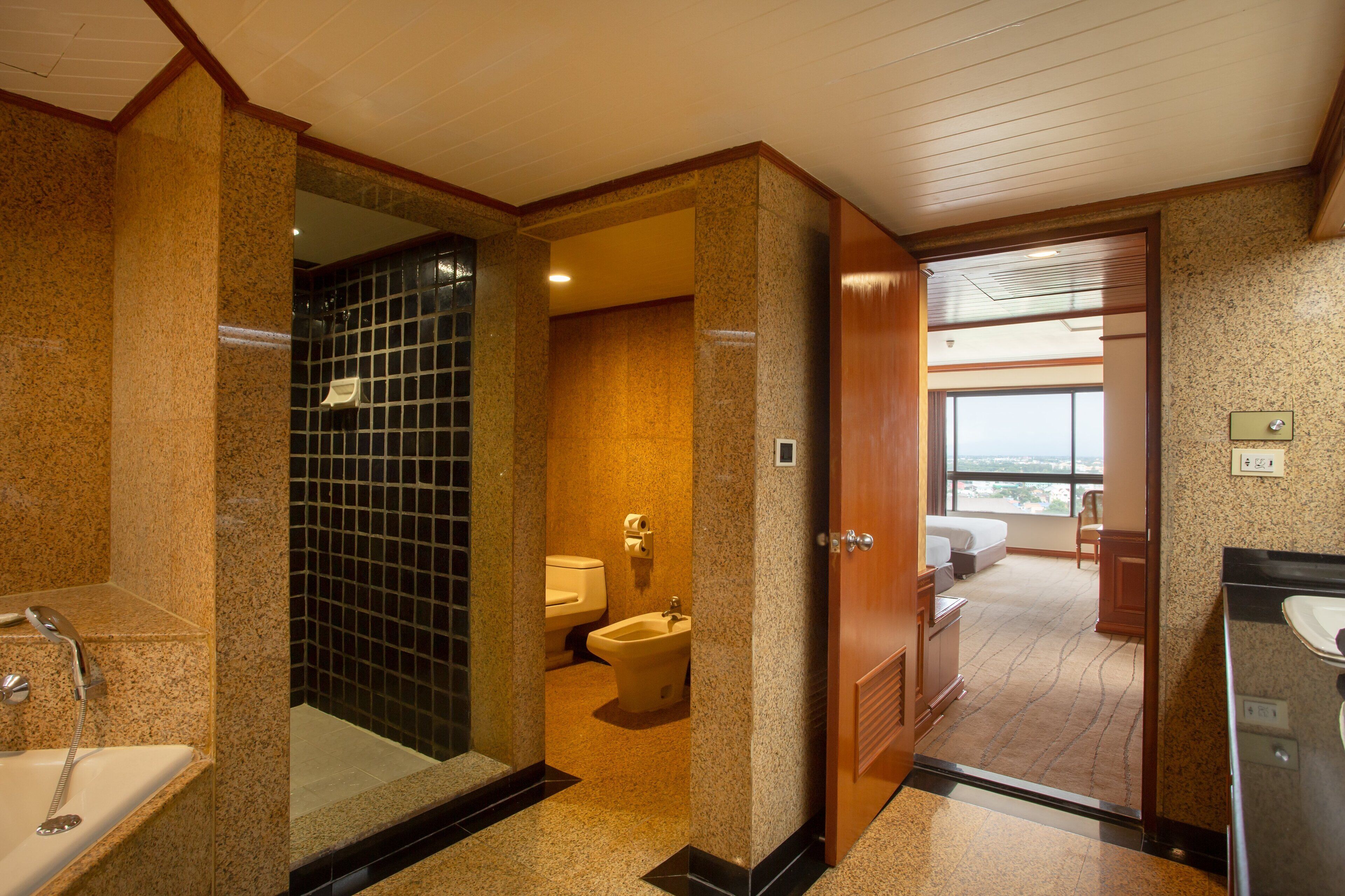 separate bathtub and shower, free toiletries, hair dryer, bathrobes