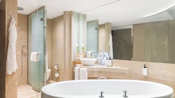 Deluxe Room | Bathroom | Separate tub and shower, hair dryer, bathrobes, slippers