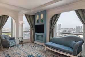 Tower Oceanfront Room | Offers 50% Spa, 30% Laundry, 25% F&B Off | For stays until 31 July 2026 | Living area | LCD TV - Al Habtoor Grand Resort, Autograph Collection® (Dubai)