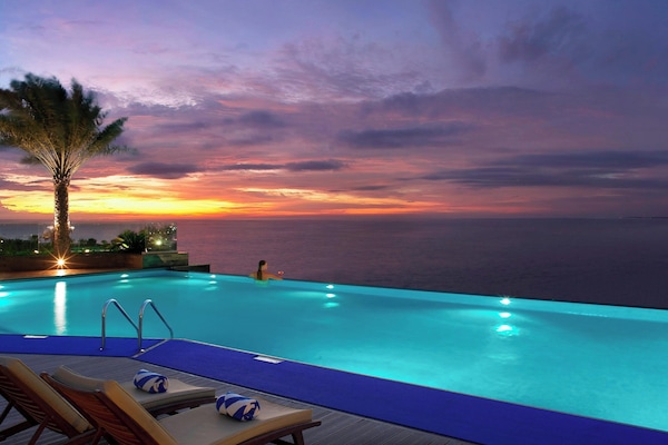 2 outdoor pools, pool umbrellas, pool loungers