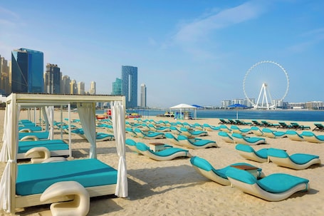 Playa privada, camas de playa gratis, sillas reclinables de playa