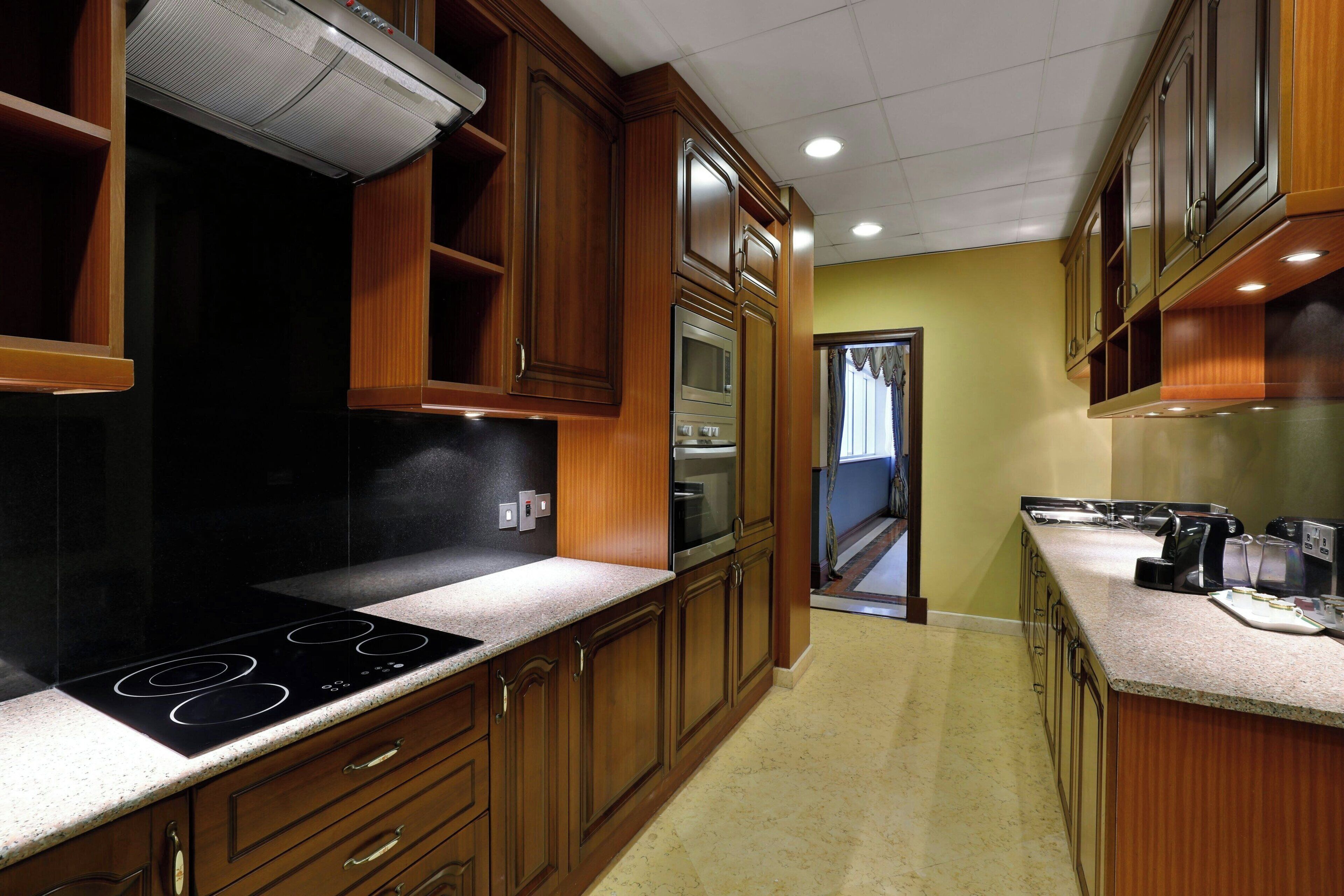 espresso maker, coffee/tea maker, dining tables