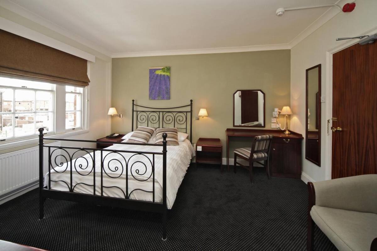 desk, blackout curtains, iron/ironing board, free wifi