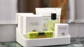 A set of Gilchrist & Soames toiletries arranged on a tray.