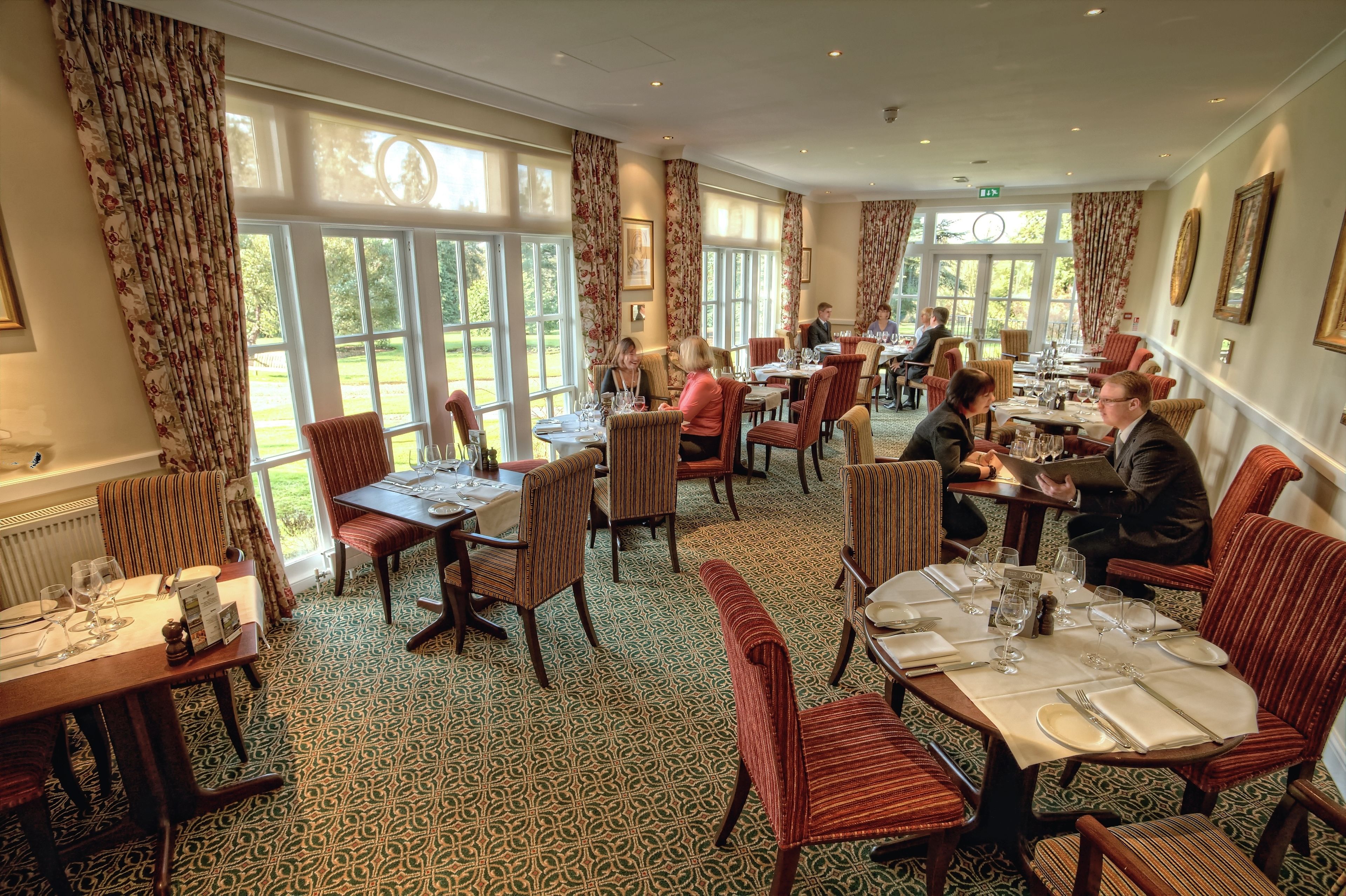 Breakfast, lunch, dinner served; international cuisine, garden views 