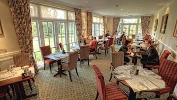 Breakfast, lunch, dinner served; international cuisine, garden views