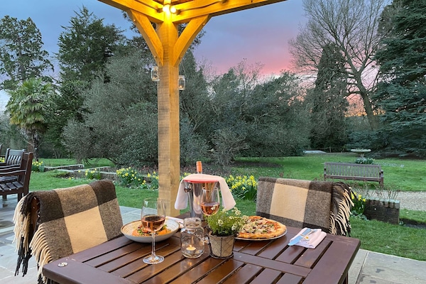 Breakfast, lunch, dinner served; international cuisine, garden views