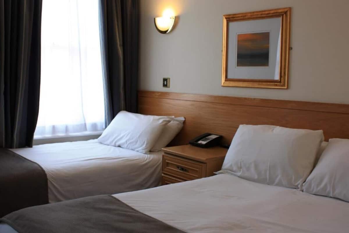 In-room safe, desk, WiFi (free), bed sheets