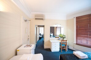 Executive Family Room | 1 bedroom, desk, iron/ironing board, free WiFi