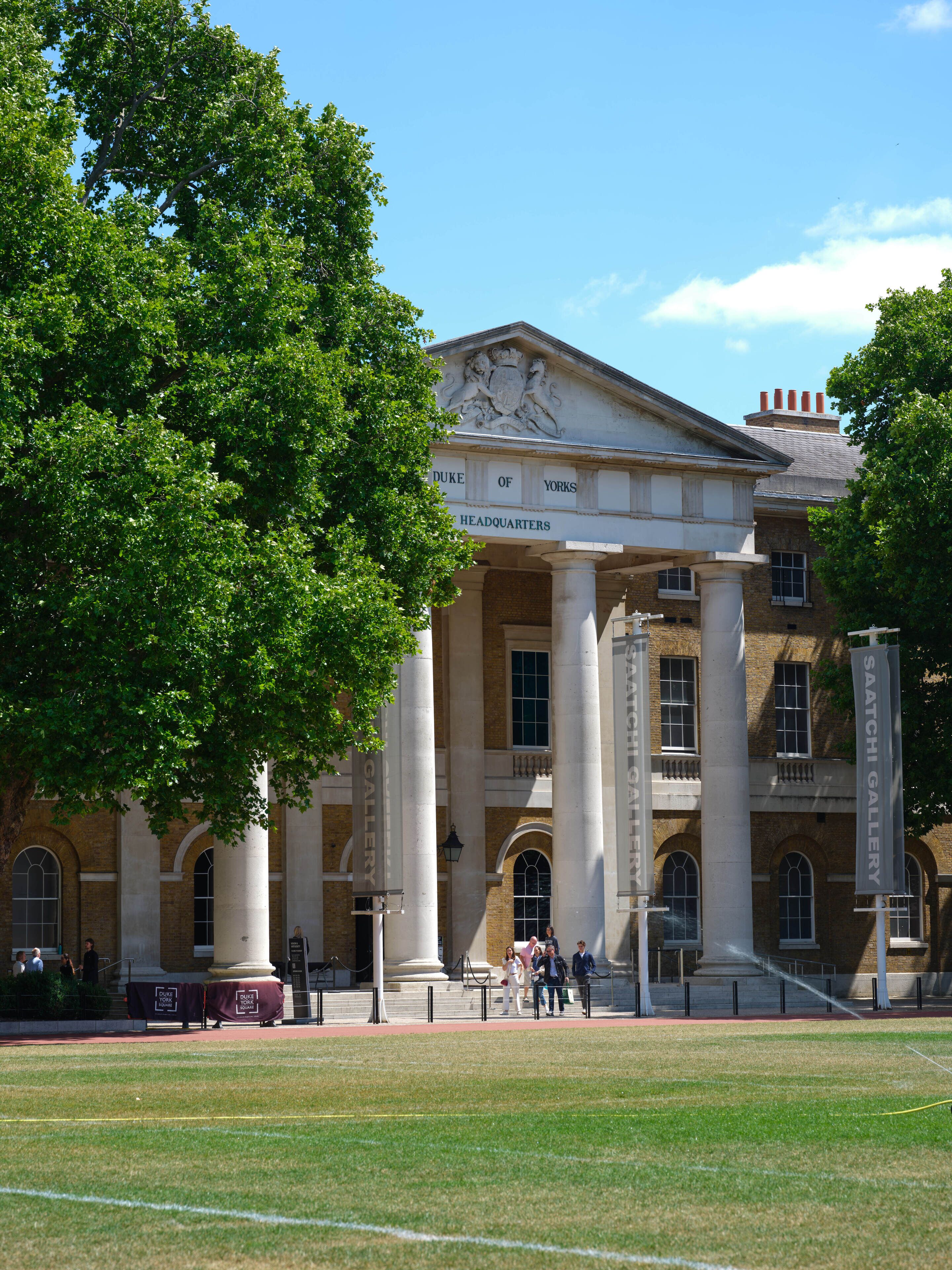 A historic building with classical architecture, featuring columns and a prominent entrance.