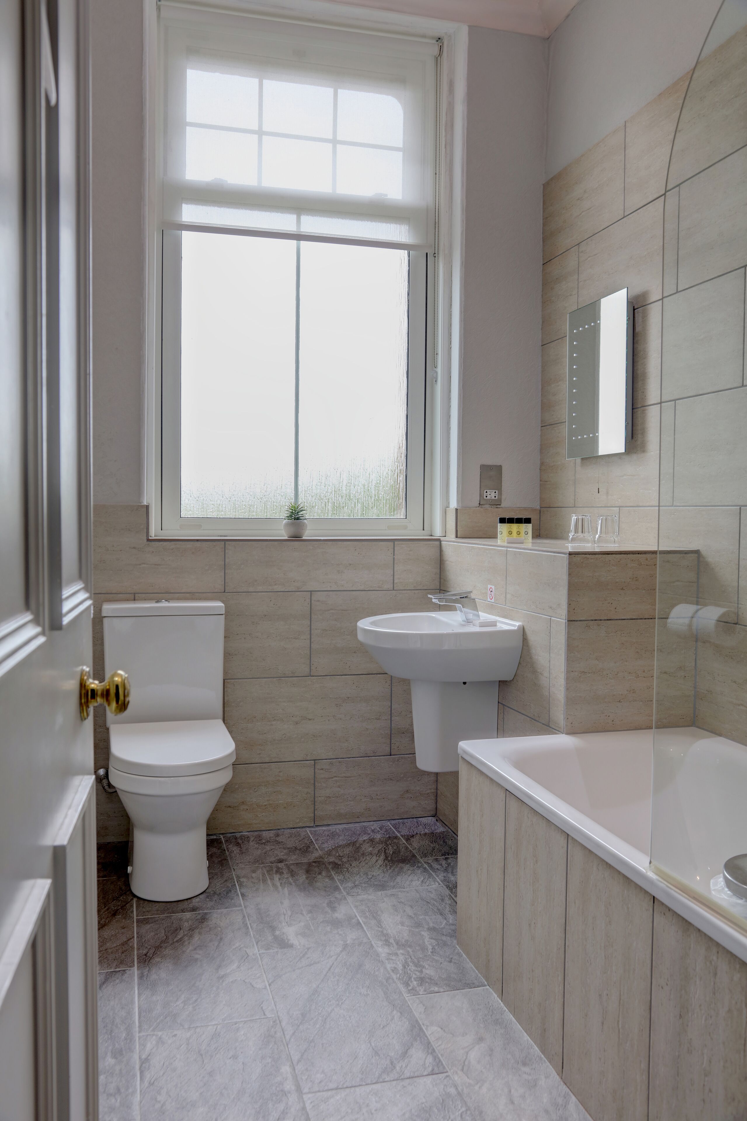 family room, 1 double bed with sofa bed, non smoking | bathroom | free toiletries, hair dryer, towels