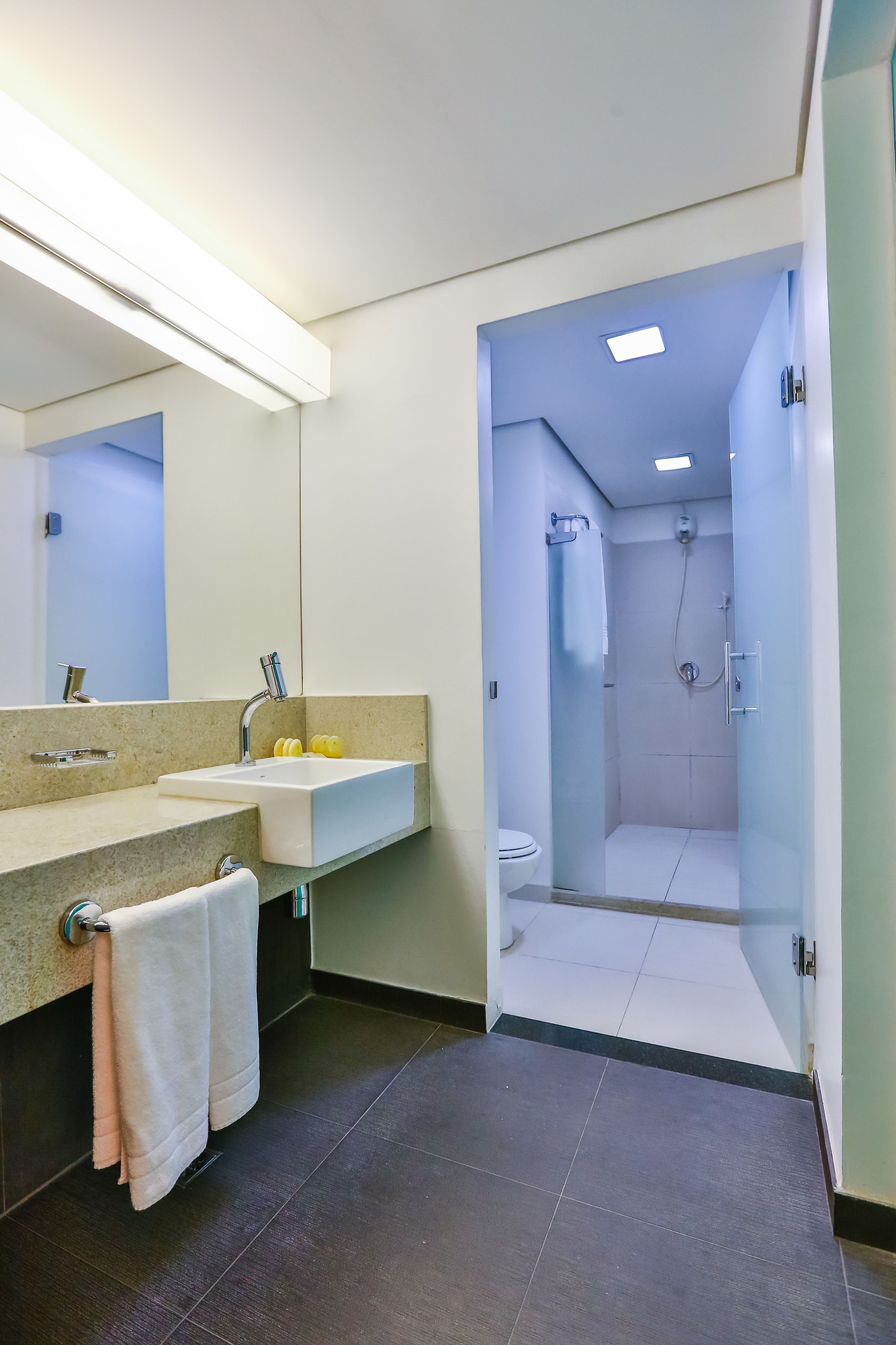 superior triple room | bathroom | shower, free toiletries, hair dryer, towels
