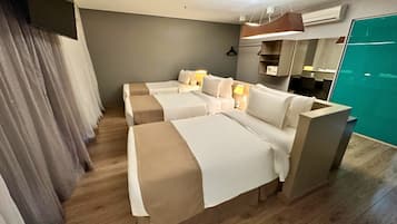 Quarto triplo superior | Frigobar, cofres nos quartos, cortinas blackout, quartos à prova de som