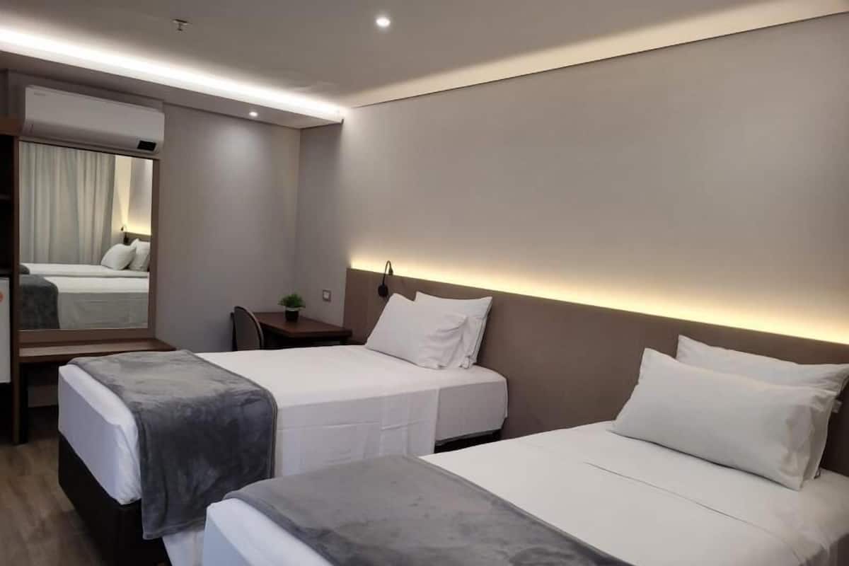 Minibar, desk, WiFi (free), bed sheets
