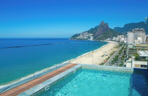 Outdoor pool, pool umbrellas, pool loungers