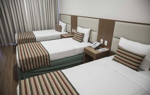 Standard Triple Room | Minibar, in-room safe, blackout curtains, free WiFi