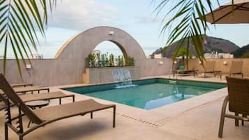 Outdoor pool, pool umbrellas, sun loungers