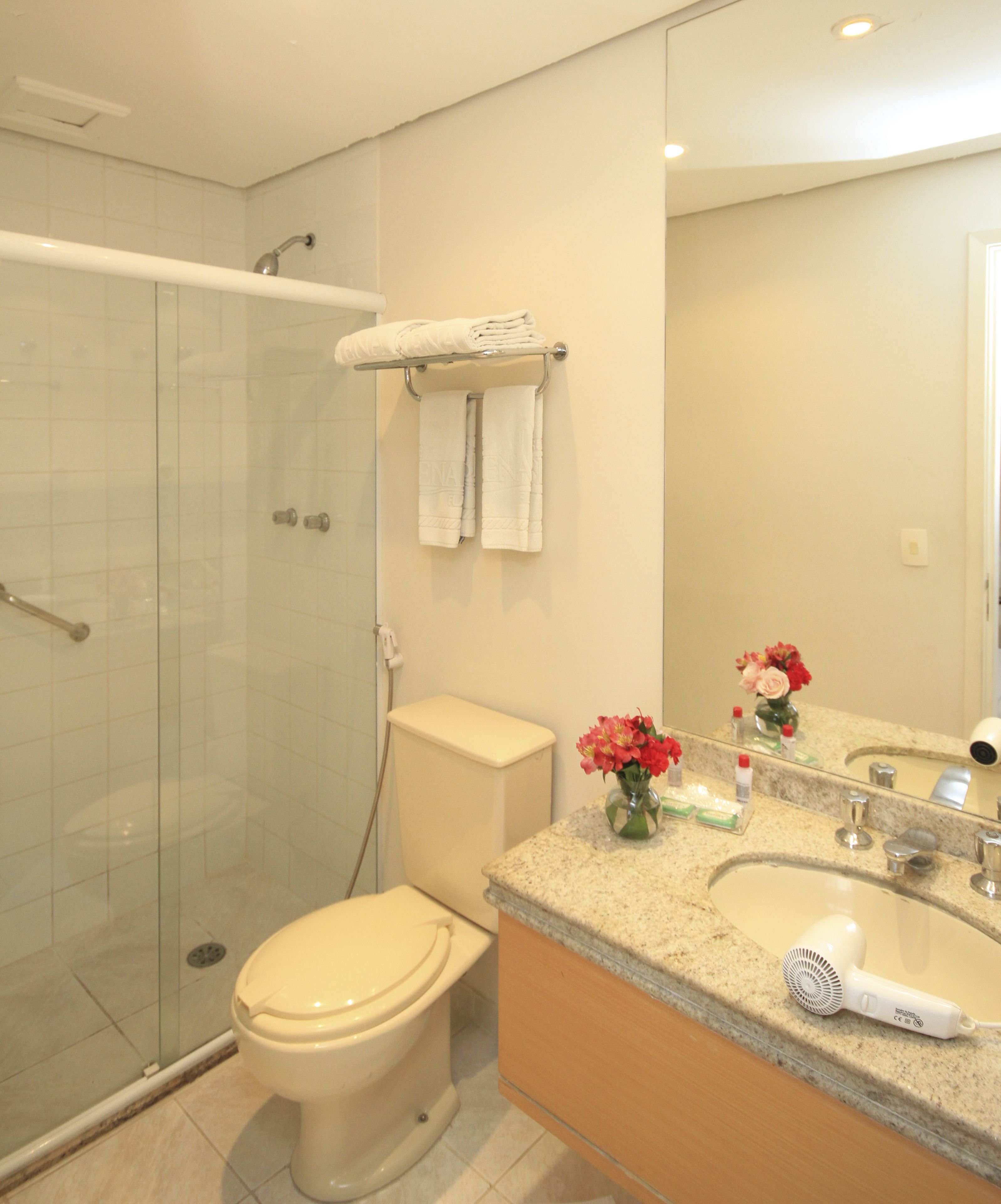 shower, free toiletries, towels, shampoo