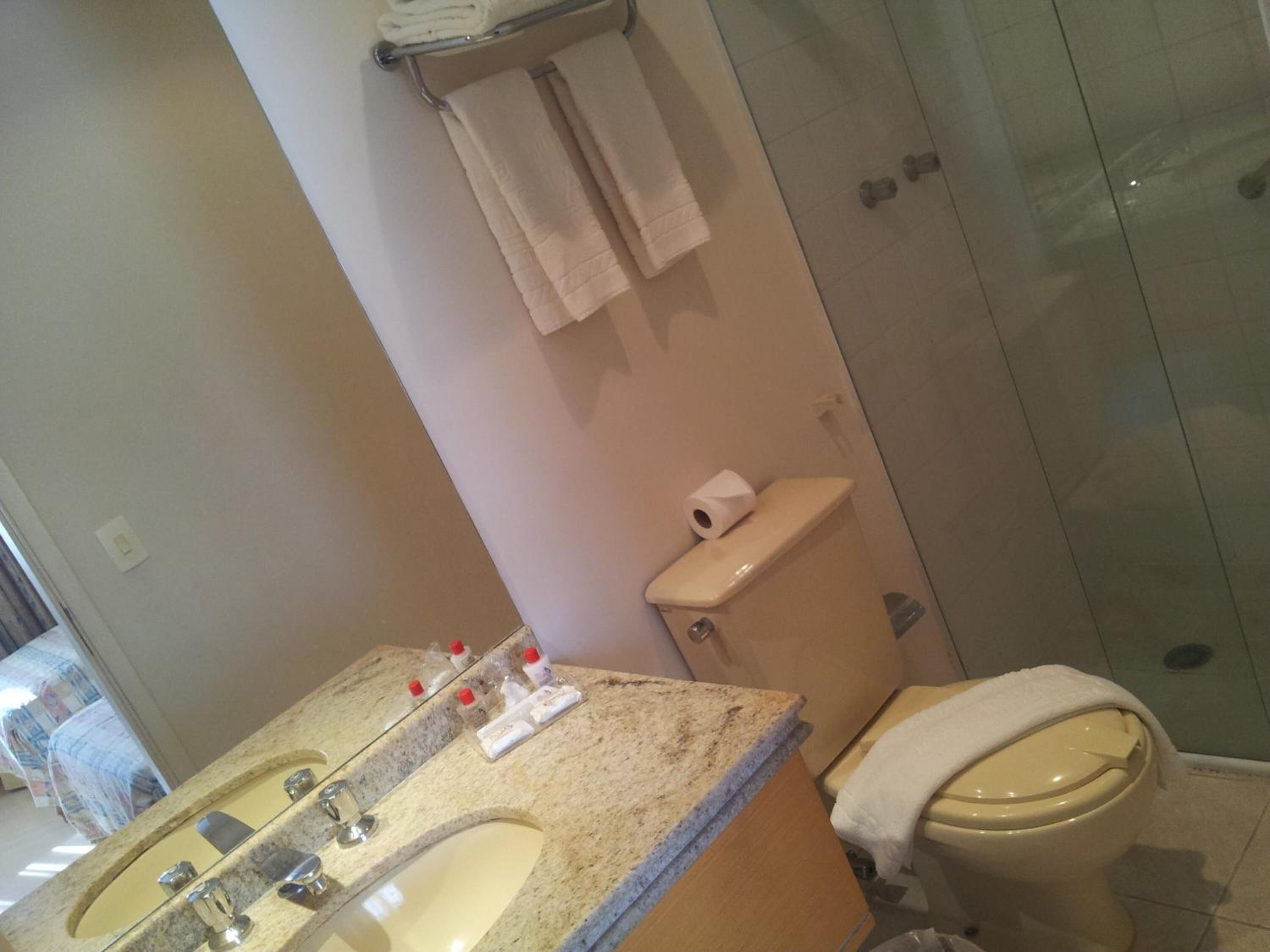 shower, free toiletries, towels, shampoo