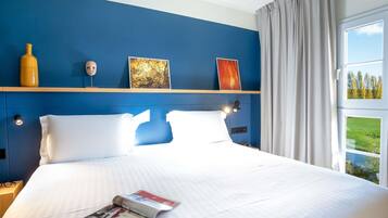 Literie de qualité supérieure, coffres-forts dans les chambres, bureau