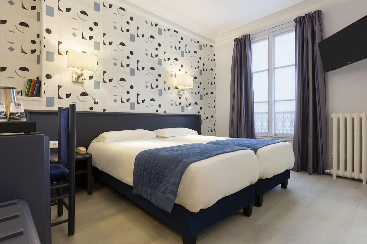 Twin Room, Non Smoking, Private Bathroom | In-room safe, desk, iron/ironing board, free WiFi