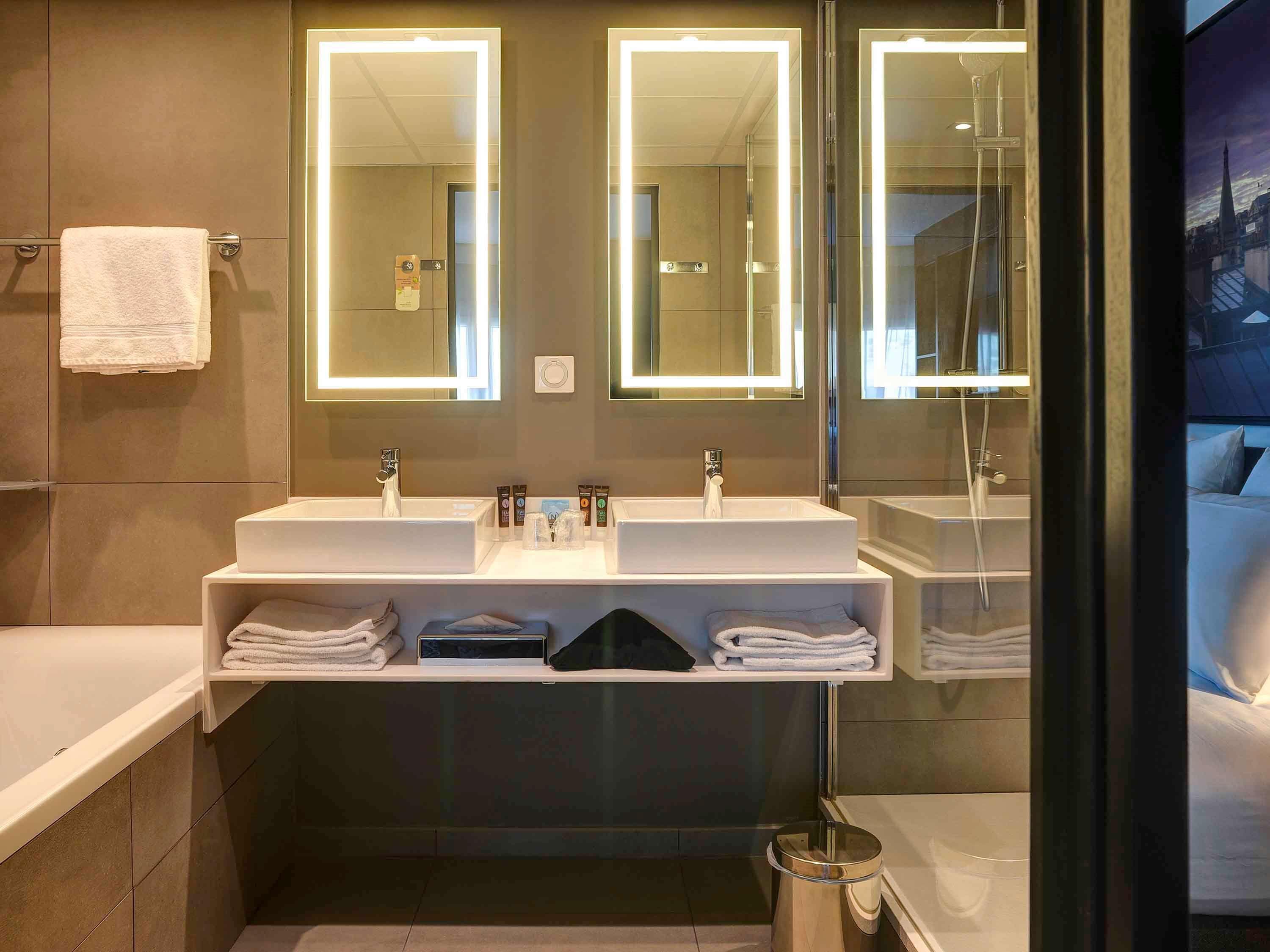 suite, 1 king bed with sofa bed (paris view) | bathroom | eco-friendly toiletries, hair dryer, towels