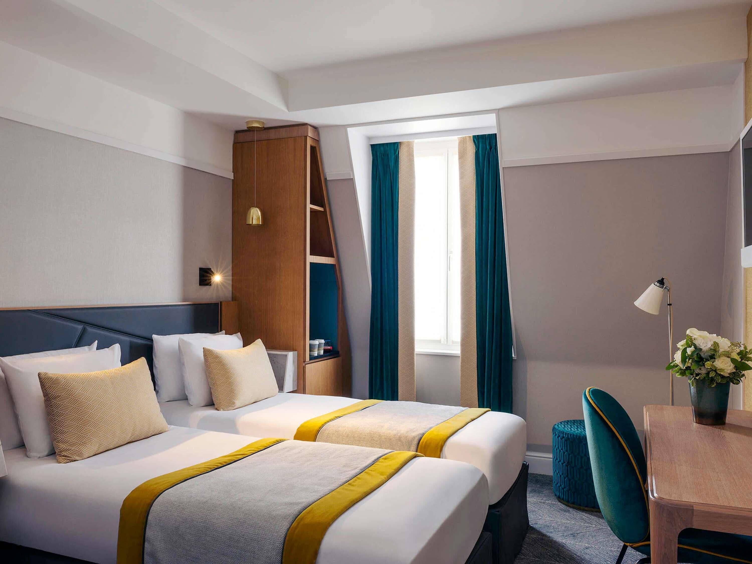 Chambre Classique avec lits jumeaux, 2 lits une place | Minibar, coffres-forts dans les chambres, bureau, chambres insonorisées