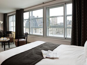 Premium bedding, pillow-top beds, minibar, in-room safe