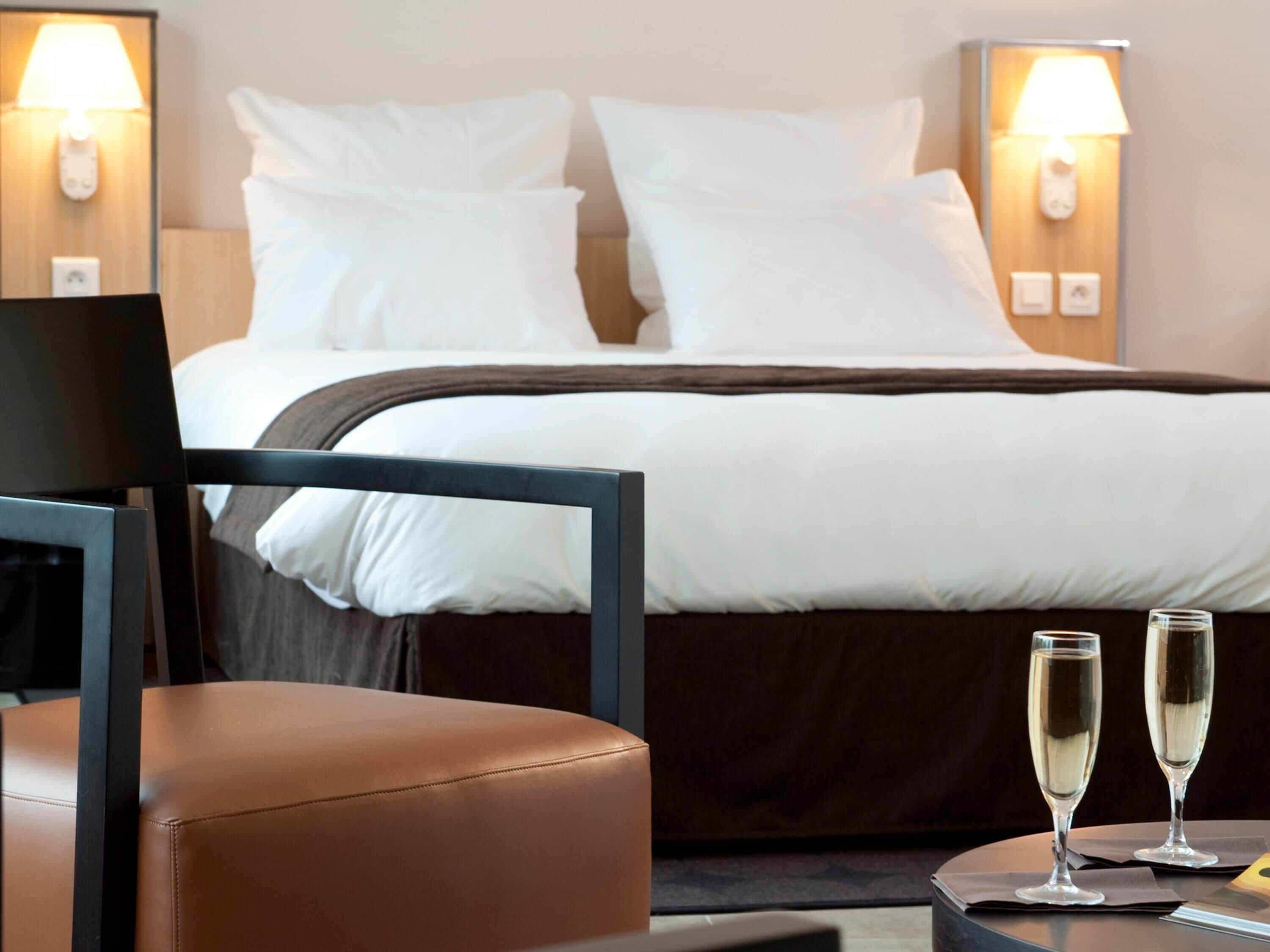 Premium bedding, pillow-top beds, minibar, in-room safe
