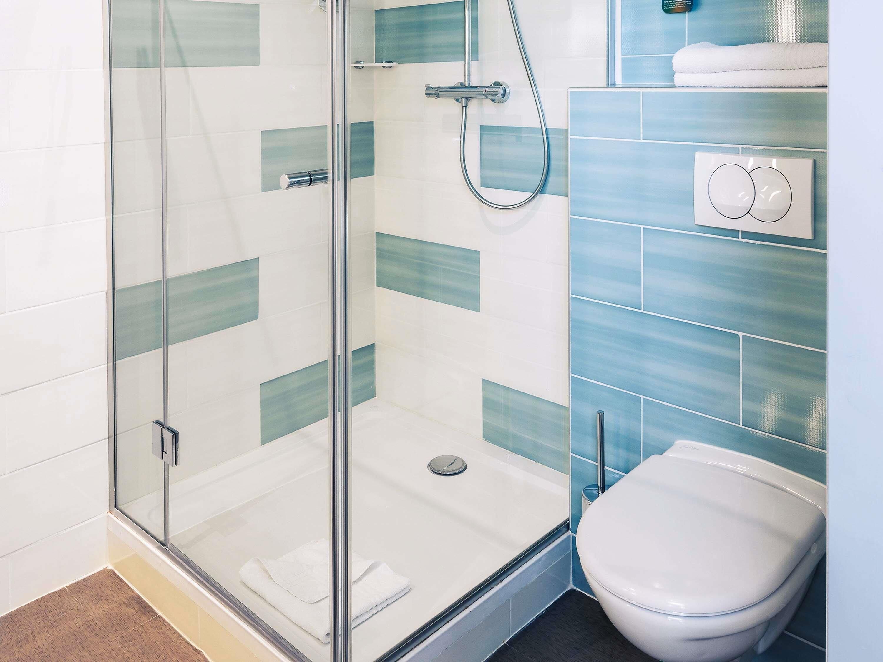 Eco-friendly toiletries, hair dryer, towels