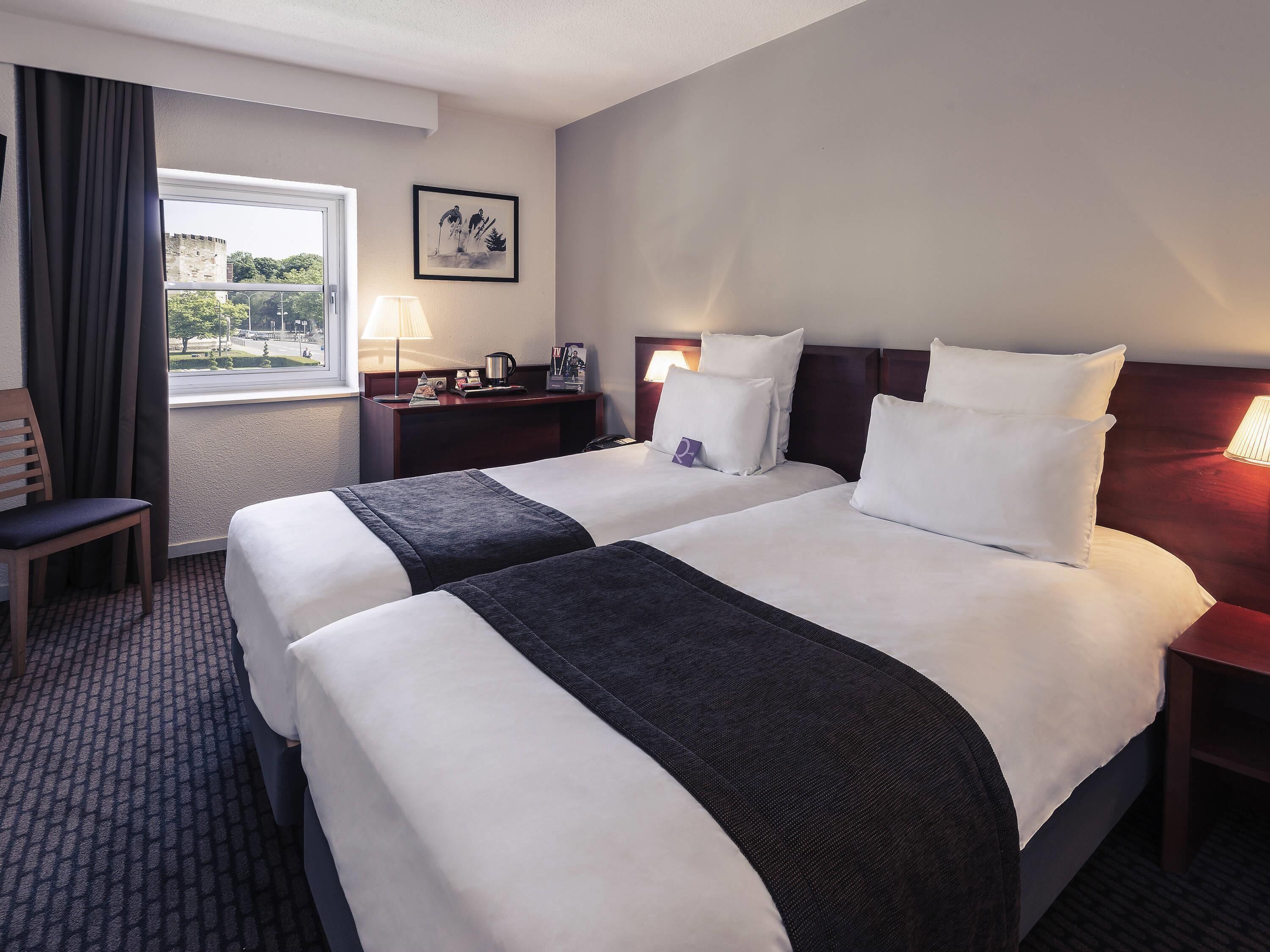 Premium bedding, pillow-top beds, minibar, in-room safe