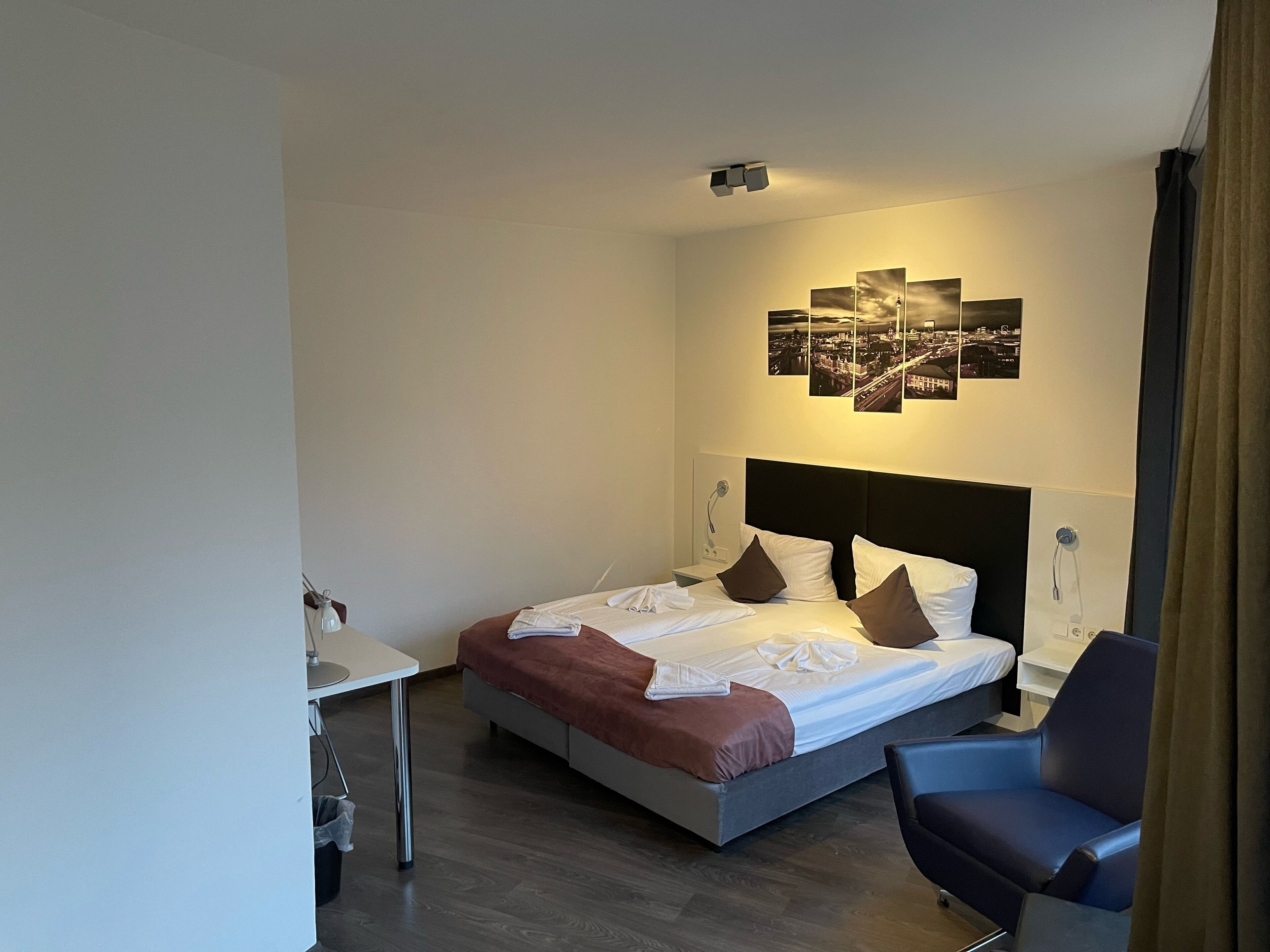 superior double room, non smoking, city view | living area | flat-screen tv