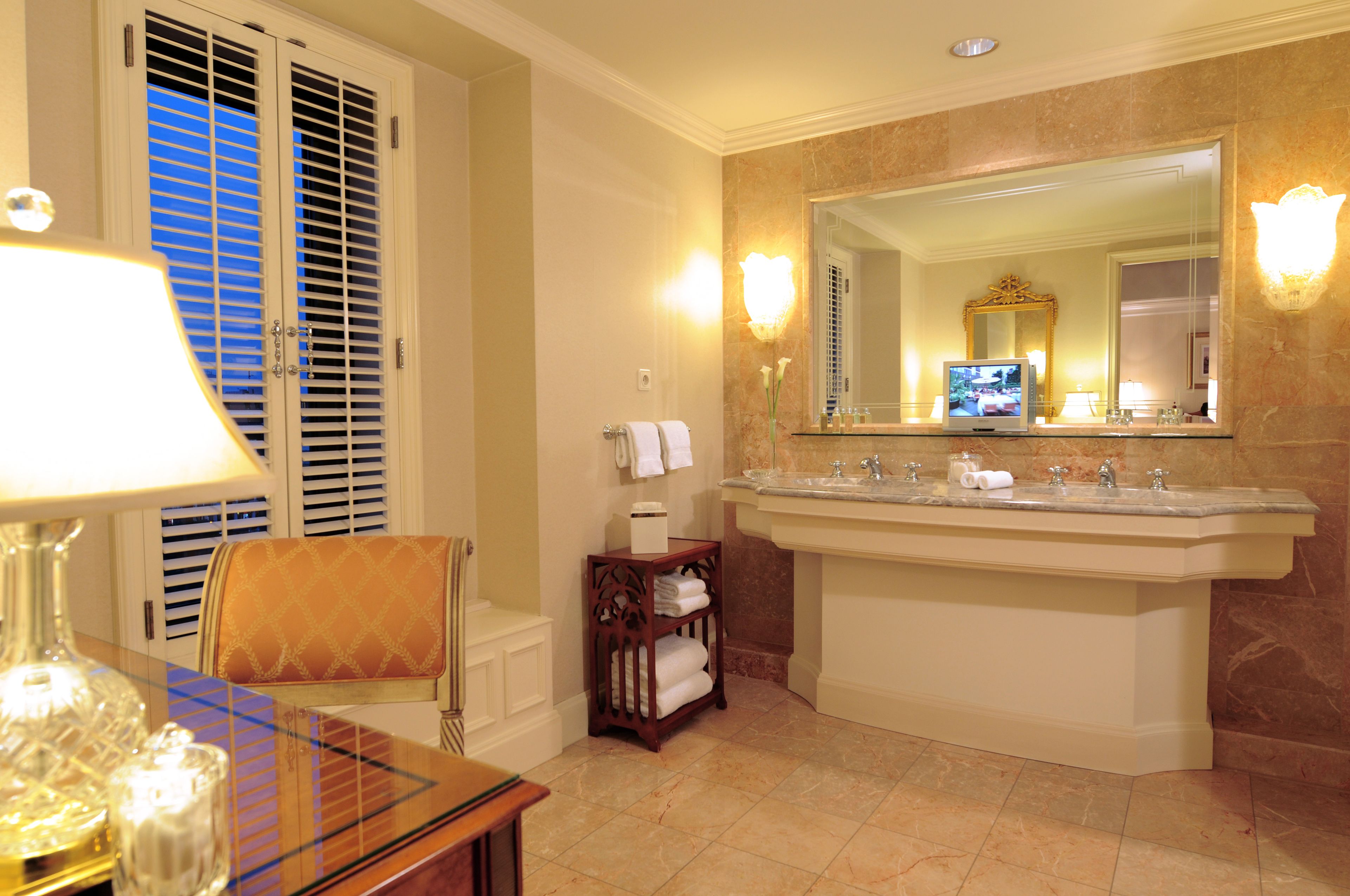 separate bathtub and shower, rainfall showerhead, designer toiletries