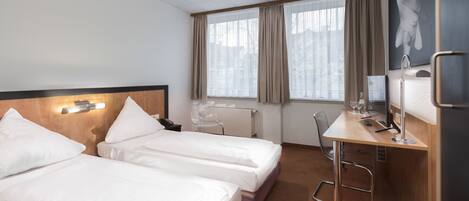 Hypo-allergenic bedding, desk, iron/ironing board, free cots/infant beds