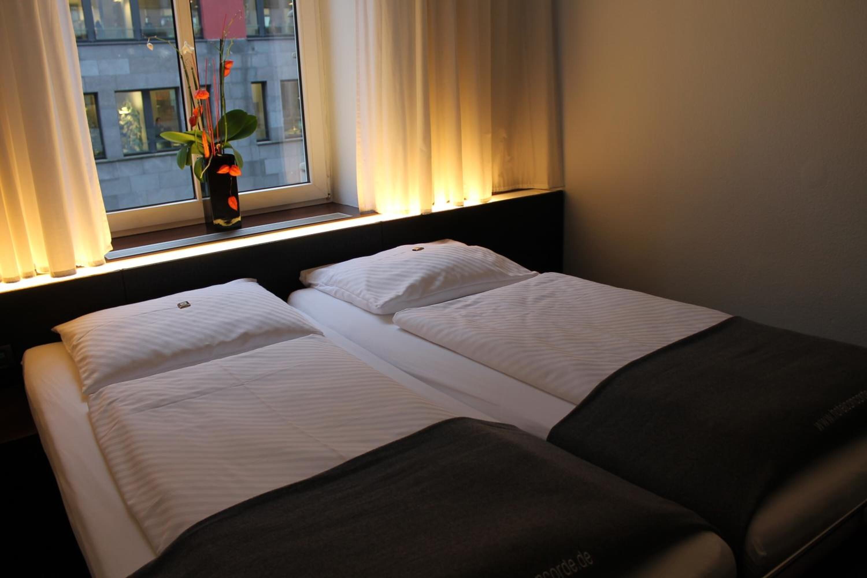 premium bedding, minibar, desk, laptop workspace